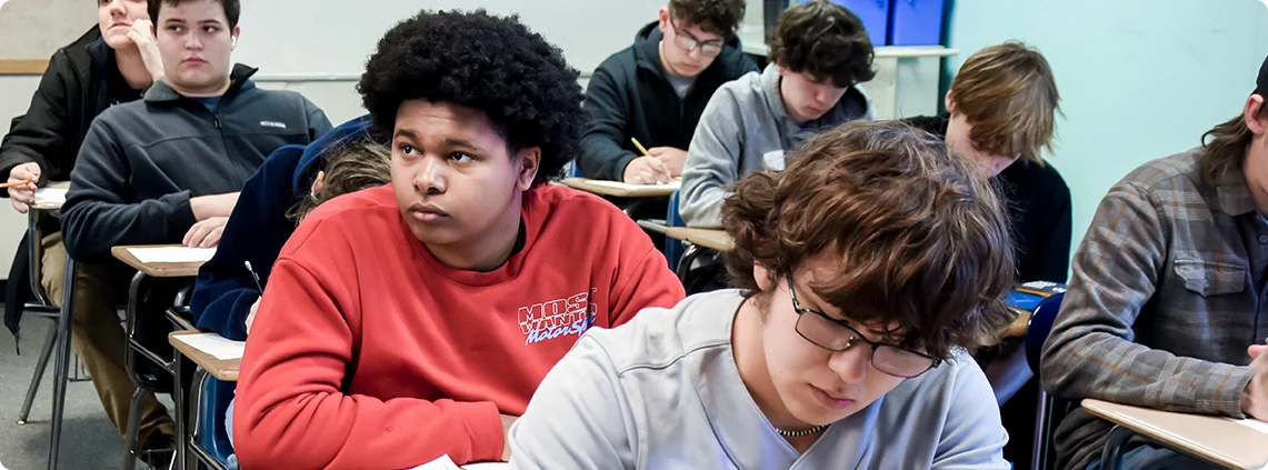 Black student in red sweatshirt