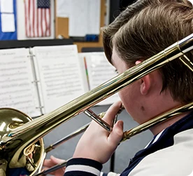 Boy playing trombone