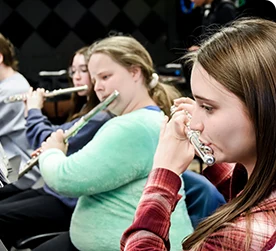 Girls playing flute